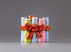 A famille rose 'candles tied by a ribbon' pot and cover
