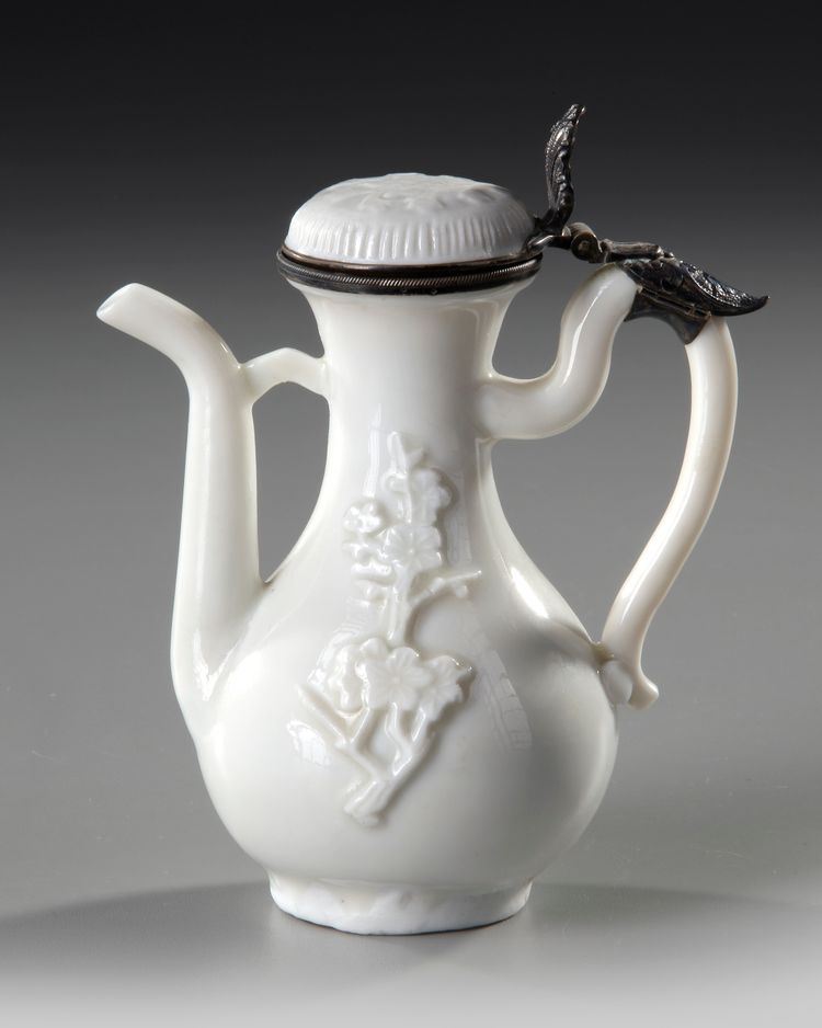 A CHINESE BLANC DE CHINE PEAR SHAPE WINE POT AND COVER, 17TH CENTURY