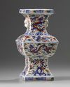 A Chinese wucai square-section dragon and phoenix' vase, zun
