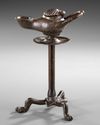 A BRONZE LAMP WITH PANTHER FOOT CANDELABRA, EARLY BYZANTINE,  5TH-6TH CENTURY AD