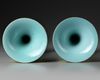 A PAIR OF CHINESE YELLOW-GROUND FAMILLE ROSE GU VASES, QING DYNASTY (1644-1911)