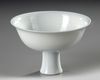 A CHINESE BLANC DE CHINE STEM BOWL, 17TH CENTURY