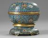 A Chinese cloisonné enamel 'Islamic market' round box and cover and stand