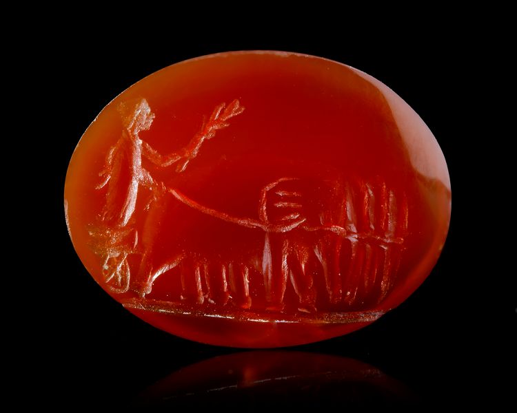 A ROMAN CARNELIAN INTAGLIO WITH AN ELEPHANT QUADRIGA, 1ST CENTURY BC-AD