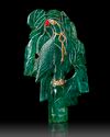 A  MUGHAL CARVED EMERALD DEPICTING A PARROT IN A TREE, 19TH CENTURY