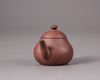 A Chinese yixing teapot and cover