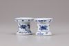 A pair of blue and white porcelain pounces