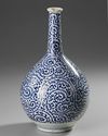 A JAPANESE BLUE AND WHITE SAKE BOTTLE VASE , WITH OCTOPUS AND KARAKUSA, LATE EDO PERIOD, 18TH CENTURY