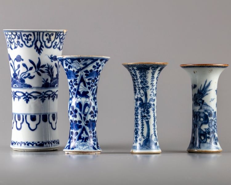 FOUR CHINESE BLUE AND WHITE GU VASES, 18TH CENTURY