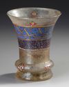 AN ISLAMIC ENAMELLED GLASS BEAKER, 19TH CENTURY
