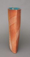 A JAPANESE RED STONEWARE VASE BY KUMAMOTO KIICHI, SHOEA PERIOD (1926-1989)