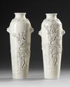 A PAIR OF CHINESE DEHUA BLANC DE CHINE ROULEAU VASES,QING DYNASTY (1644–1911)