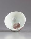 A small Chinese iron-red phoenix bowl