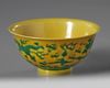 A CHINESE YELLOW-GROUND GREEN-ENAMELLED DRAGON' BOWL, QIANLONG SEAL MARK IN UNDERGLAZE BLUE AND OF THE PERIOD 1736-1795