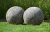 A LARGE PAIR OF LIMESTONE ORNAMENTAL SPHERES, LATE 20TH CENTURY