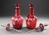PAIR OF ANTIQUE RUBY RED GLASS DECANTERS, 19TH CENTURY