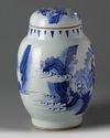 A Chinese blue and white 'figural' jar and cover