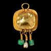 A BYZANTINE GOLD PENDANT WITH A TOPAZ INTAGLIO OF THE LAMB OF GOD, 5TH/6TH CENTURY AD