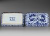 A CHINESE BLUE AND WHITE RECTANGULAR DRAGON BOX AND COVER, QING DYNASTY (1644–1911)