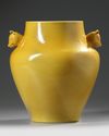 A CHINESE MUSTARD YELLOW GLAZED VASE WITH DEAR HANDLES