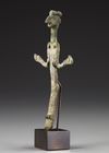 A WESTERN ASIATIC BRONZE FEMALE FIGURE, CIRCA EARLY 2ND MILLENIUM B.C.