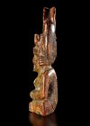 A RUSSET JADE SITTING FIGURE WEARING A PIG DRAGON ON IT'S HEAD, CHIN, HONGSHAN CULTURE