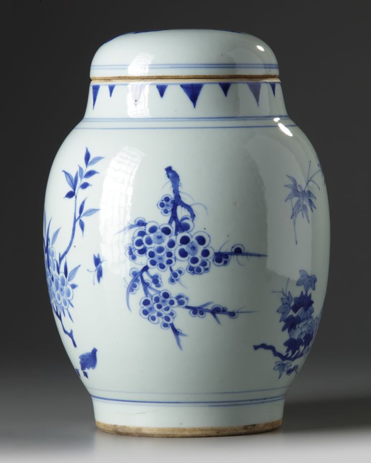 A Chinese blue and white ovoid ‘floral’ jar and cover