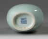 A Chinese pale celadon-glazed slender vase