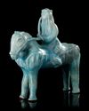 A RARE KASHAN TURQUOISE-GLAZED FIGURE OF A MONGOL, PERSIA, 13TH CENTURY