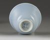 A small Chinese pale-blue glazed cup