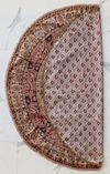 A QAJAR EMBROIDERED AND APPLIQUÉ WOOL RESHT ROUNDEL, PERSIA, EARLY 20TH CENTURY