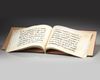 AN OTTOMAN BOOK WITH ISLAMIC CALLIGRAPY