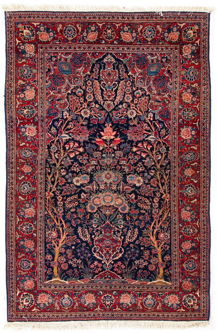 A PRAGER BLUE BACKGROUND KASHAN KURK RUG, 1920