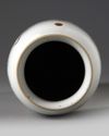 A Chinese wucai sleeve vase