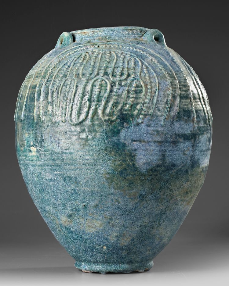 A LARGE POST SASSANIAN TURQUOISE GLAZED POTTERY STORAGE JAR,  PERSIA OR IRAQ, 7TH-8TH CENTURY