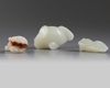 A GROUP OF CHINESE WHITE AND PALE CELADON JADE MYTHICAL BEAST CARVINGS, 20TH CENTURY