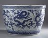 A massive Chinese blue and white 'nine dragons' jardiniere