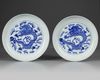 A PAIR OF CHINESE BLUE AND WHITE 'DRAGON' DISHES, 19TH-20TH CENTURY