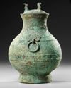 A CHINESE BRONZE RITUAL HU VASE, HAN DYNASTY (206 BC-220 AD) OR LATER