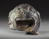 AN ACHAEMENID RHYTON HEADPIECE FORM OF A ROARING LION, CIRCA 5TH CENTURY B.C.
