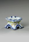 A POLYCHROME FAIENCE SALT CELLAR, MID 18TH CENTURY