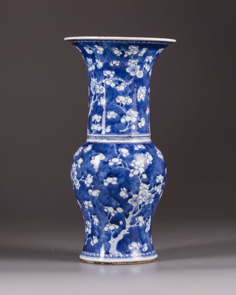 A Chinese blue and white 'prunus on cracked ice' phoenix tail vase