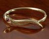 A 14 CARAT GOLD EUROPEAN 'SNAKE' BRACELET