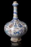 * A MINA'I POTTERY BOTTLE VASE, CENTRAL PERSIA, CIRCA 1200
