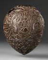 A QAJAR CARVED COCONUT HUQQA BASE, PERSIA, EARLY 19TH CENTURY