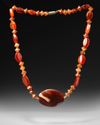 A WESTERN ASIATIC CARNELIAN NECKLACE, CIRCA 2ND CENTURY B.C.