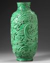 A CHINESE MOLDED GREEN GLAZED 'DRAGON' VASE