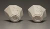 A pair of white-glazed octagonal 'prunus' cups