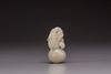 A pale celadon jade double-gourd-form pendant