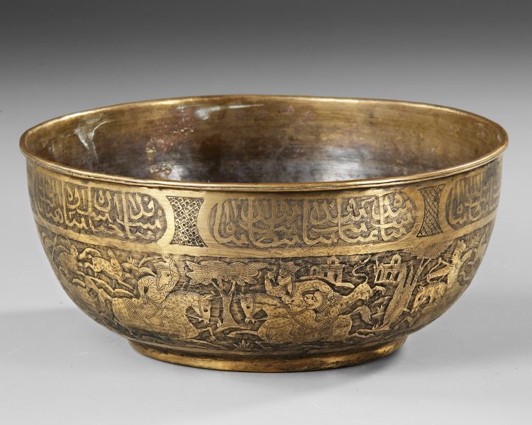 A QAJAR ENGRAVED BRASS BOWL, PERSIA, 19TH CENTURY